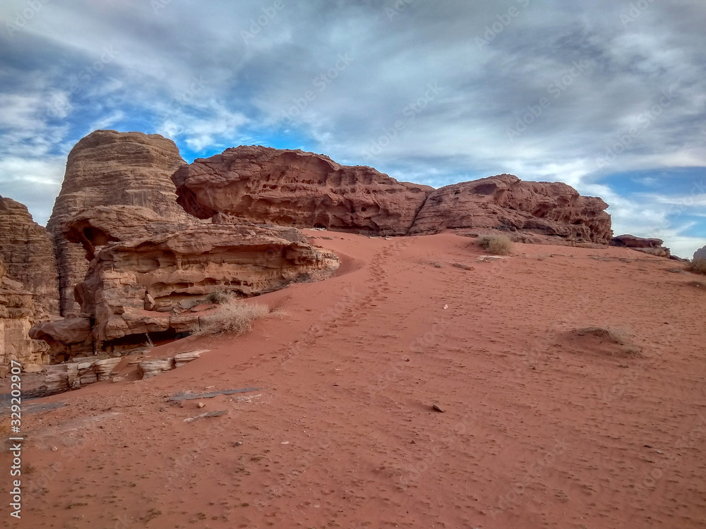 rock formations and desert landscape of Wadi Rum desert in southern Jordan. Popular tourist destination and place of Lawrence of Arabia rock formations and desert landscape of Wadi Rum desert in southern Jordan. Popular tourist destination and place of Lawrence of Arabia