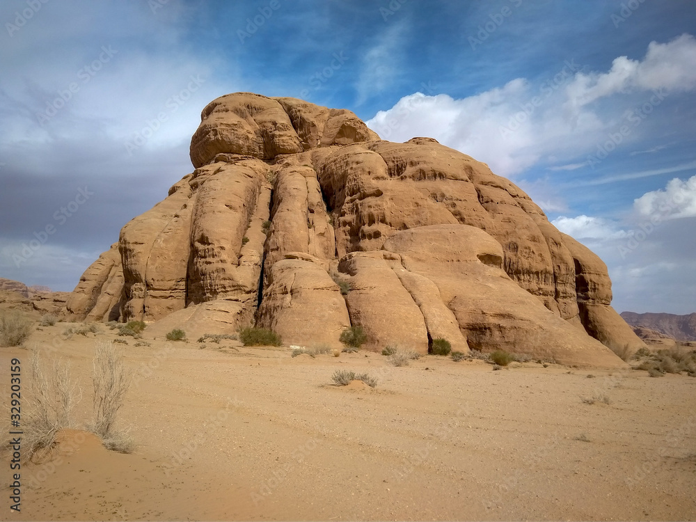 rock formations and desert landscape of Wadi Rum desert in southern Jordan. Popular tourist destination and place of Lawrence of Arabia rock formations and desert landscape of Wadi Rum desert in southern Jordan. Popular tourist destination and place of Lawrence of Arabia