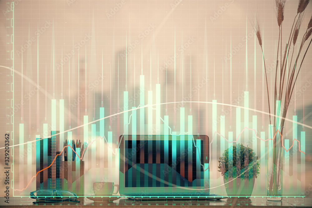 Stock market graph and table with computer background. Multi exposure. Concept of financial analysis.