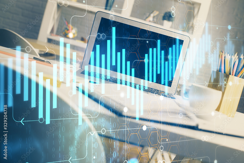Financial chart drawing and table with computer on background. Double exposure. Concept of international markets. Financial chart drawing and table with computer on background. Double exposure. Concept of international markets.