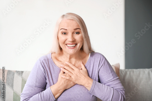 Mature woman using video ch...