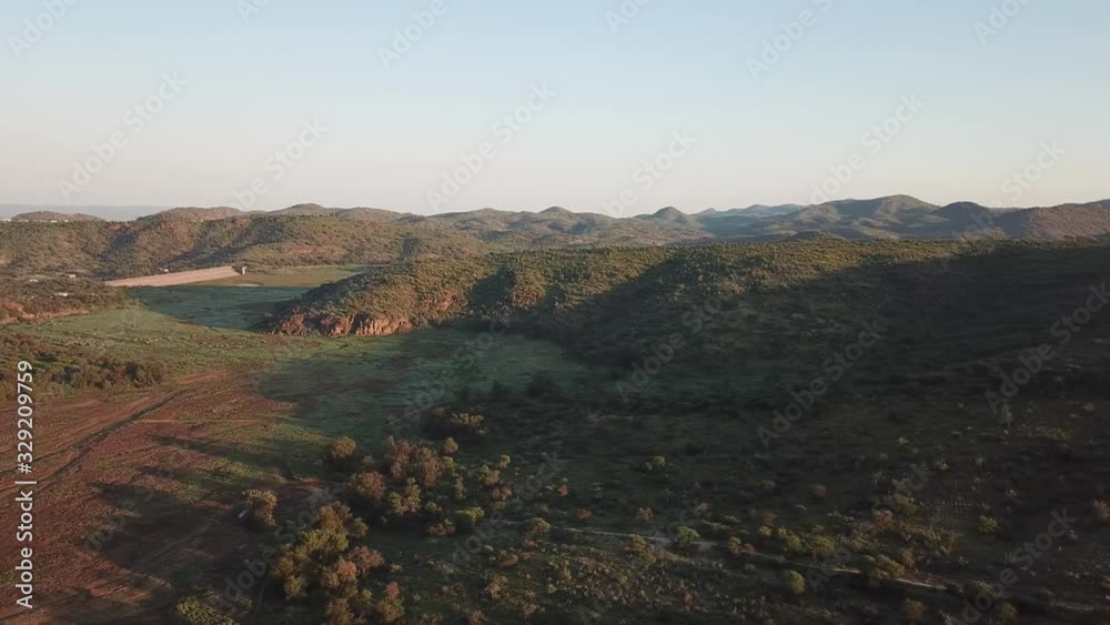 4K aerial drone video of greeen savanna hills and Avis Dam near historical railway bridge on main B6 road from Windhoek to Gobabis in central highland Khomas Hochland of Namibia, southern Africa 4K aerial drone video of greeen savanna hills and Avis Dam near historical railway bridge on main B6 road from Windhoek to Gobabis in central highland Khomas Hochland of Namibia, southern Africa