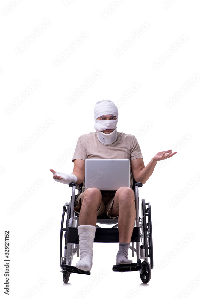 Injured man in wheel-chair isolated on white Injured man in wheel-chair isolated on white