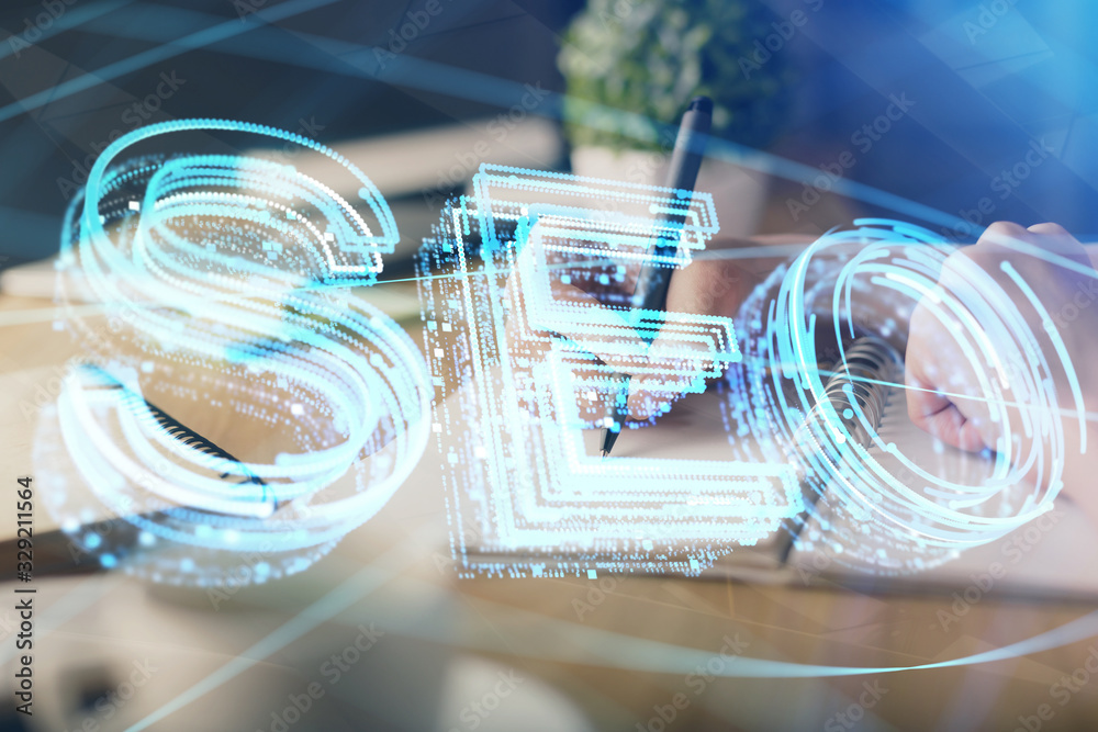 Multi exposure of woman's hands making notes with SEO icon. Concept of Search engine optimization Multi exposure of woman's hands making notes with SEO icon. Concept of Search engine optimization