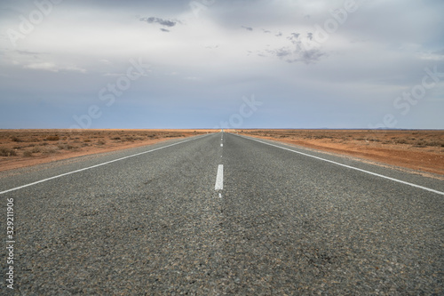 Endless road into the desert  Outback  Australia