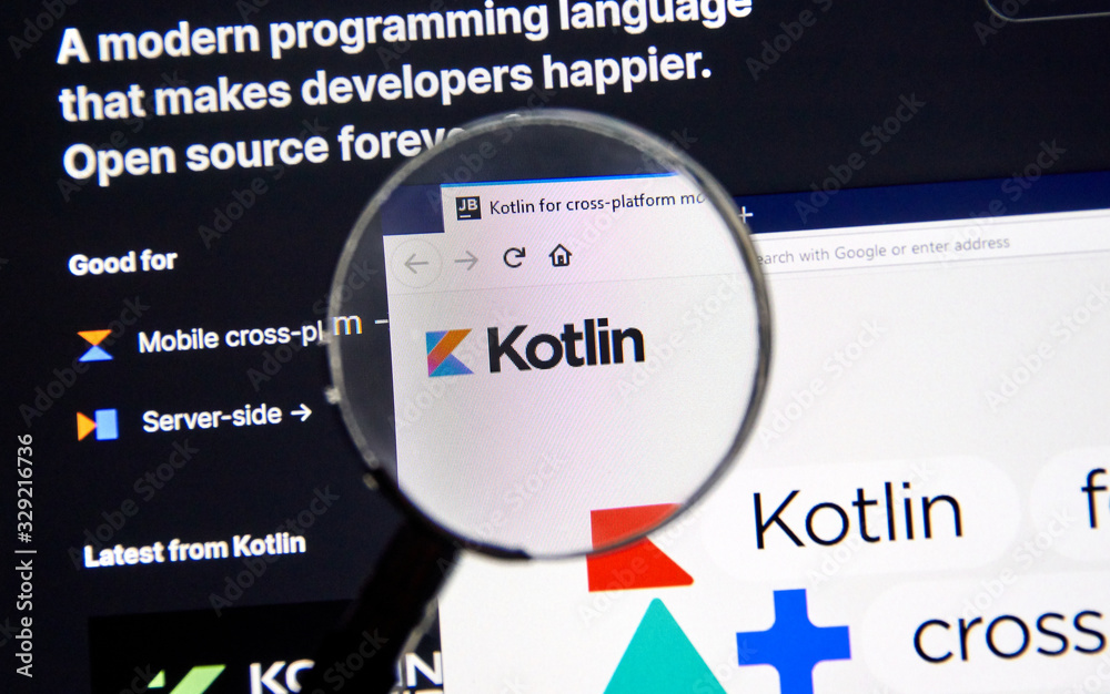 Kotlin example code, site and logo under magnifying glass Stock Photo ...