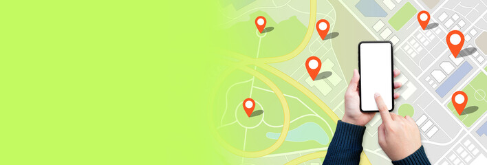 Navigation and digital map concepts with young person using gps on smartphone and city town background for marking location point