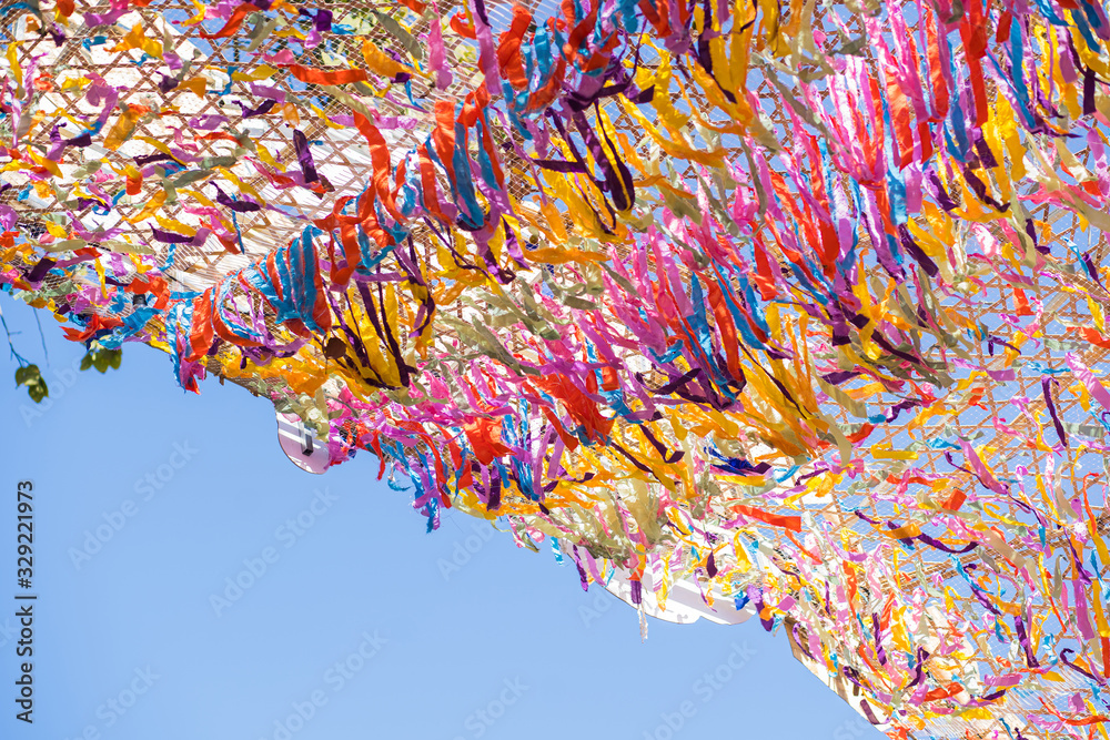 Fototapeta premium Colored fabric stretched in the city