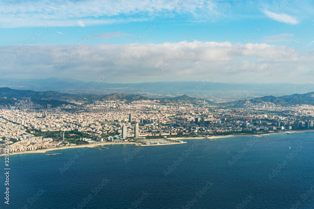 Panoramic aerial photography of Barcelona city, beaches, and sea