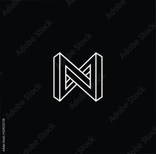 Minimal elegant monogram art logo. Outstanding professional trendy awesome MN NM initial based Alphabet icon logo. Premium Business logo White color on black background