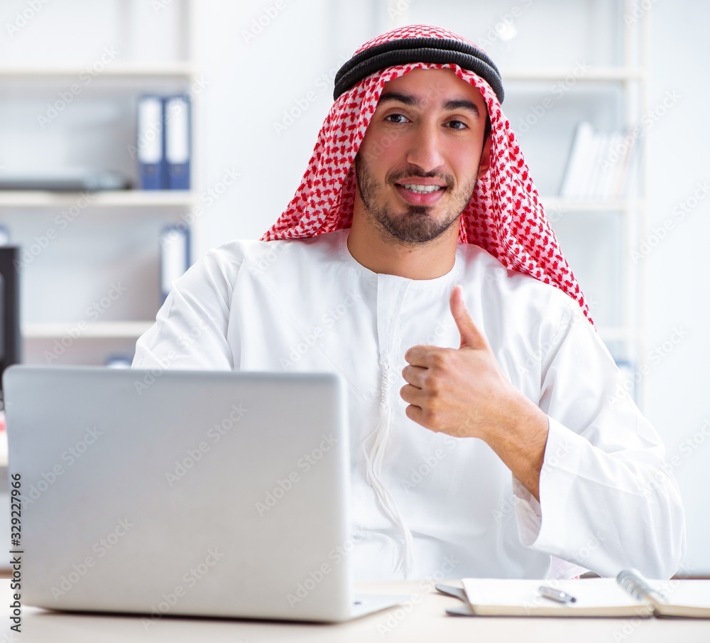 Arab businessman working in the office Arab businessman working in the office
