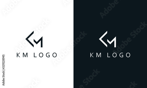 Minimal abstract line art letter KM logo. This logo icon incorporate with letter K and M in the creative way. photo