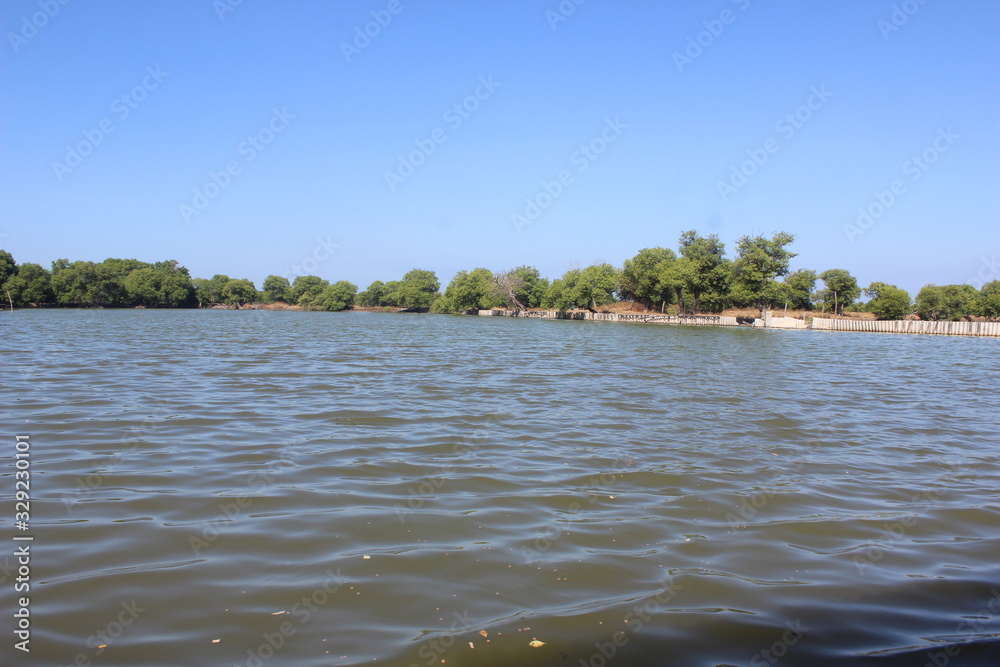 milkfish fishing pond, in the East Java district of Sidoarjo, Indonesia milkfish fishing pond, in the East Java district of Sidoarjo, Indonesia