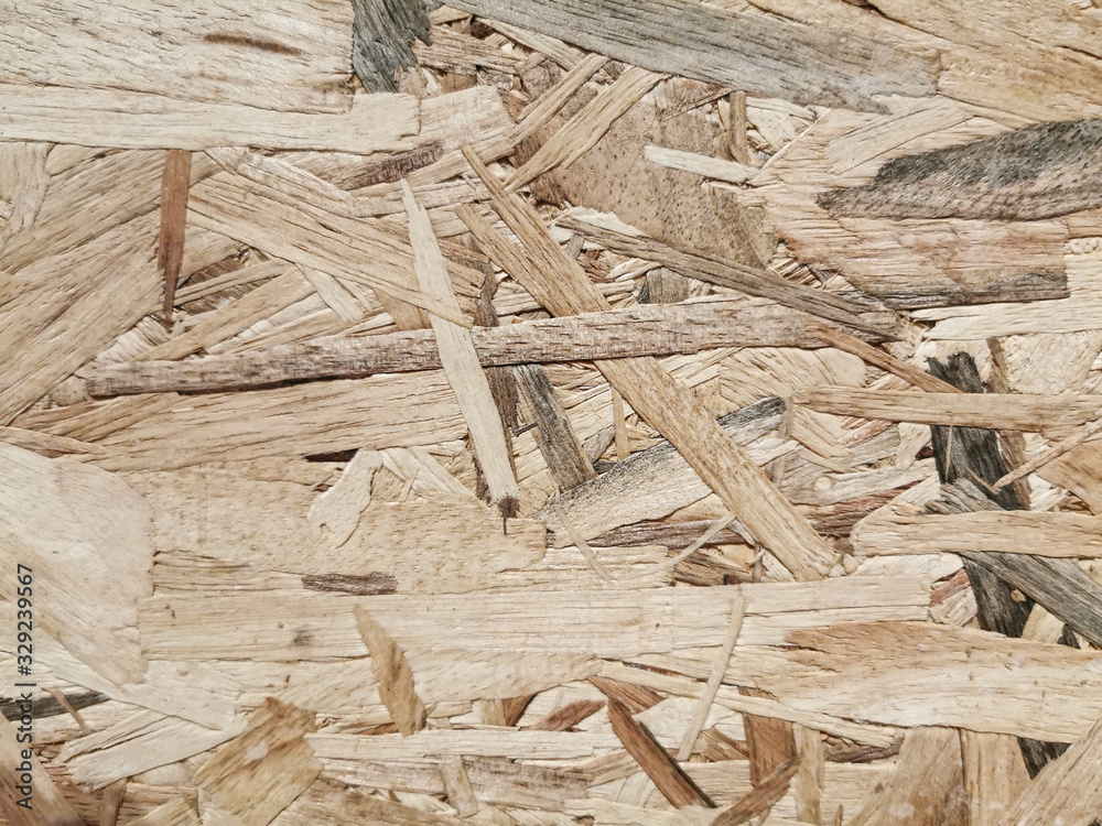 OSB oriented strand board surface texture. Background for wood and craft feeling. OSB oriented strand board surface texture. Background for wood and craft feeling.