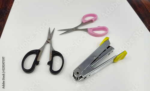 stapler and sisor isolated on a white background.