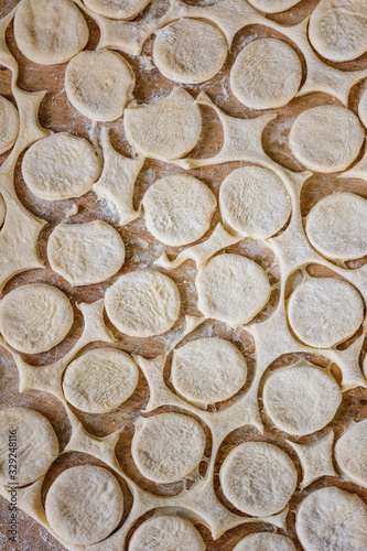 Cut circles for dumplings, texture from the dough.2020