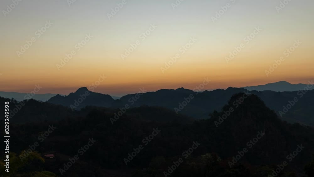Time lapse view of colorful sunrise over mountain at Mae Hong Son , Thailand. Time lapse view of colorful sunrise over mountain at Mae Hong Son , Thailand.