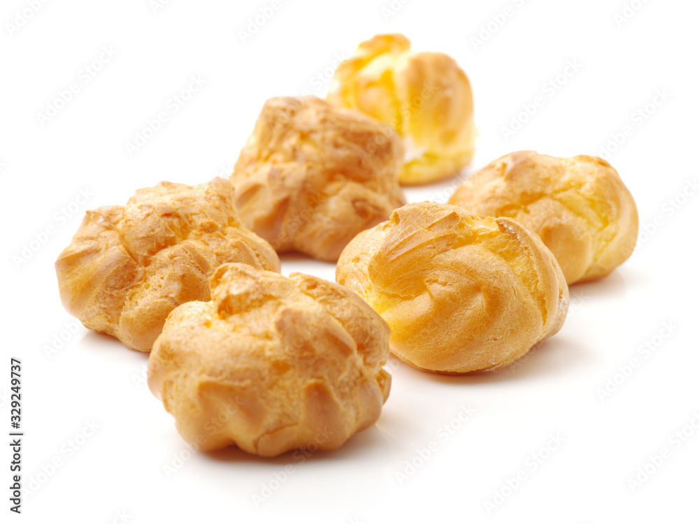 eclairs filled with fresh cream on white background