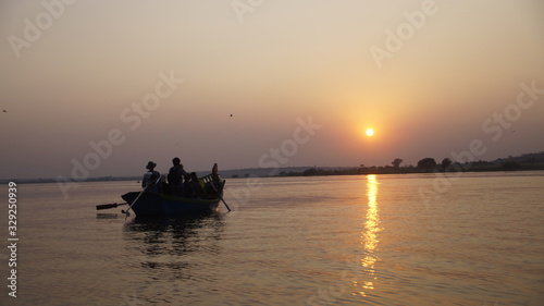 Rowing into the sunset © Sanjay