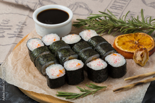 japanese sushi food. Roll in nori with rice, snow crab and caviar. photo