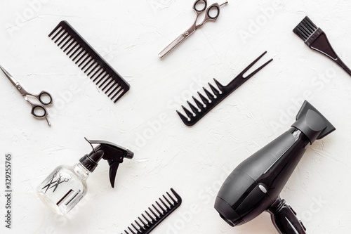 Hairdresser tools pattern on white background top-down