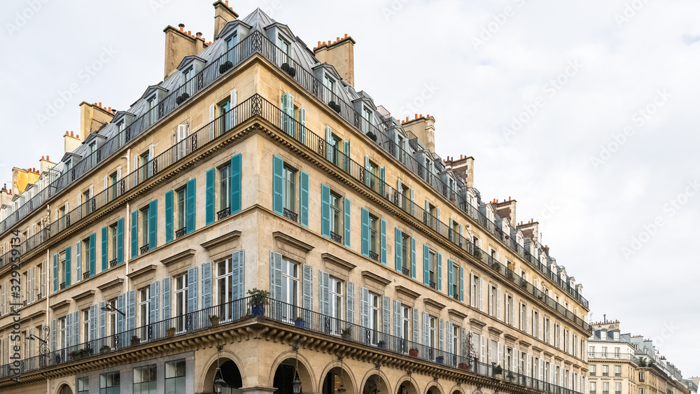 Paris, typical facade and windows, beautiful building rue de Rivoli