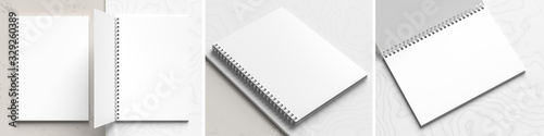 A4 format spiral binding notebook mock up on white marble background. Realistic notebook mock up rendered with three different angles. 3D illustration.
