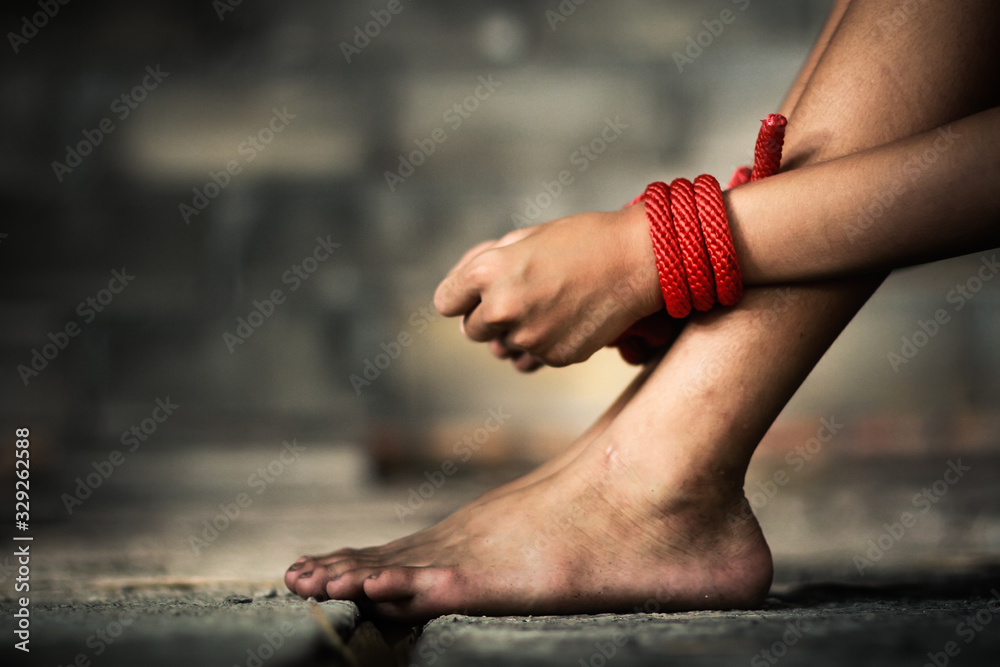 Wrinkled child wrist The concept of use of violence and human trafficking