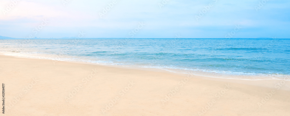 Fototapeta Beautiful beach in summer, blue sea with white sand, Banner background.