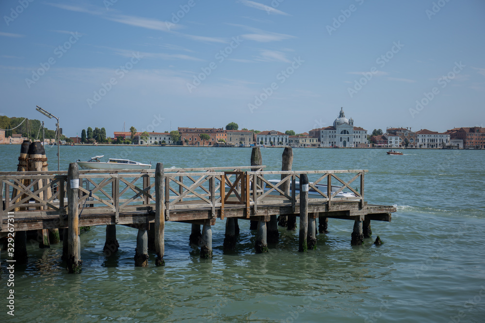 Fototapeta premium pier in venice with boats