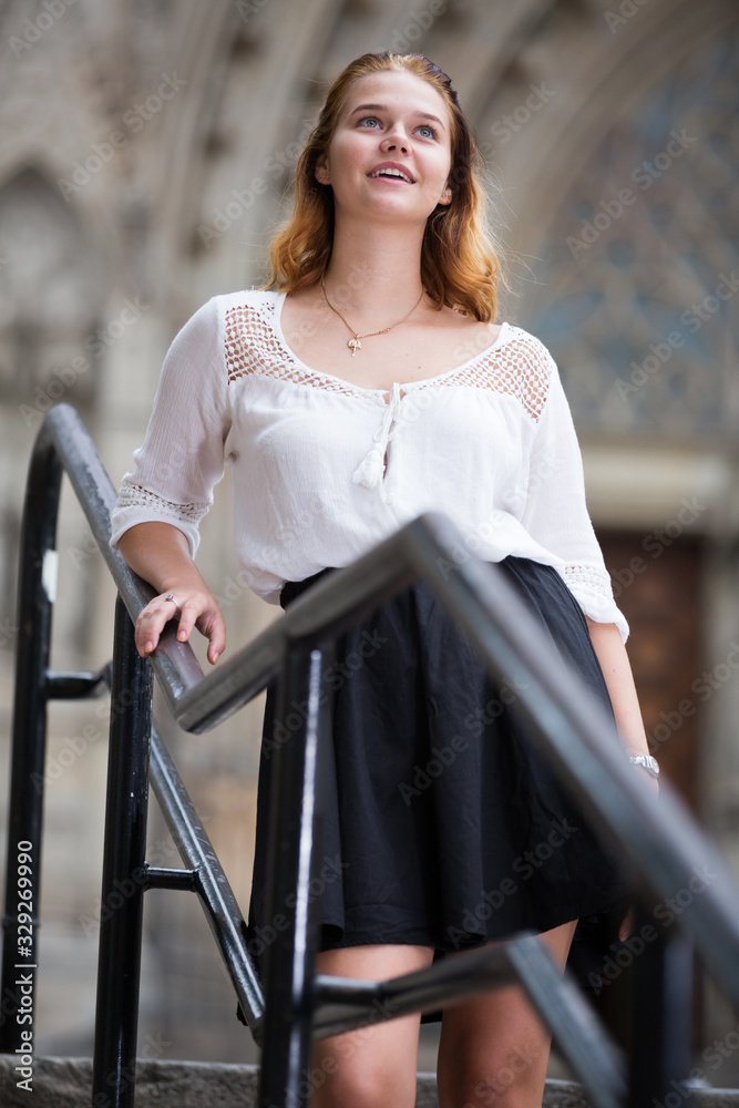 Woman Using Handrail female on handrail and the stone stairs Stock Photo | Adobe Stock