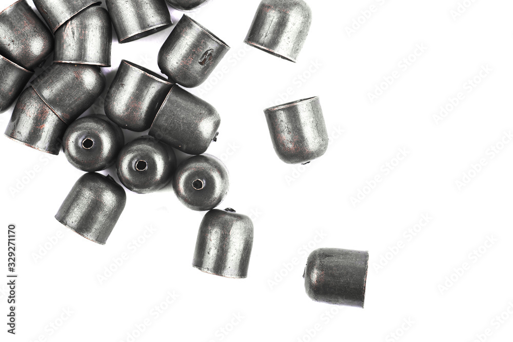 Metal frames for jewelry are scattered on a white background Metal frames for jewelry are scattered on a white background
