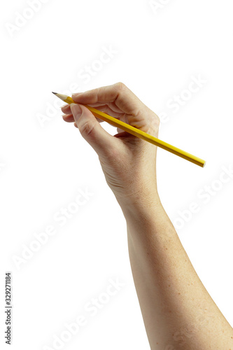 Elegant woman's hand holding a yellow lead pencil. Useful for presentations and visual graphics on whiteboards. More photo's with same graceful hand. Easy to isolate and stand free into .png