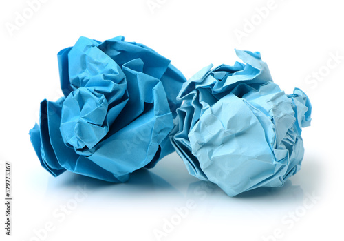 blue ball crumpled paper on a white background