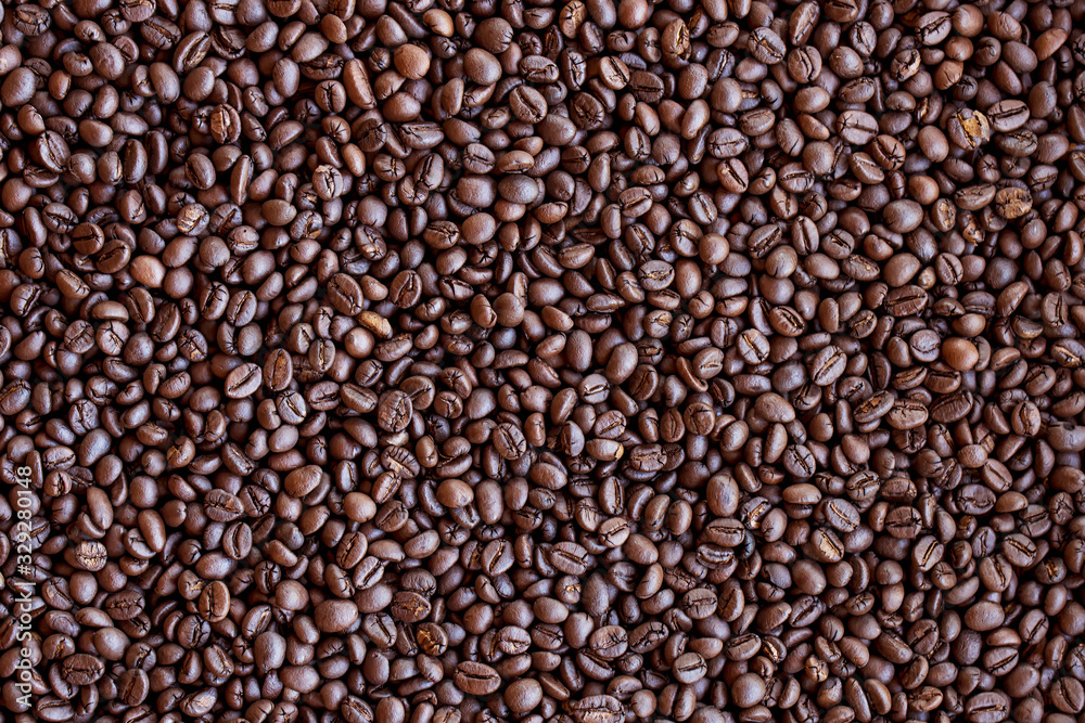 Roasted coffee beans background.