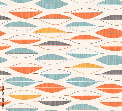 seamless mid century modern feather or leaf pattern.  Cheerful abstract retro design for fabric, wallpaper, backgrounds and decor.