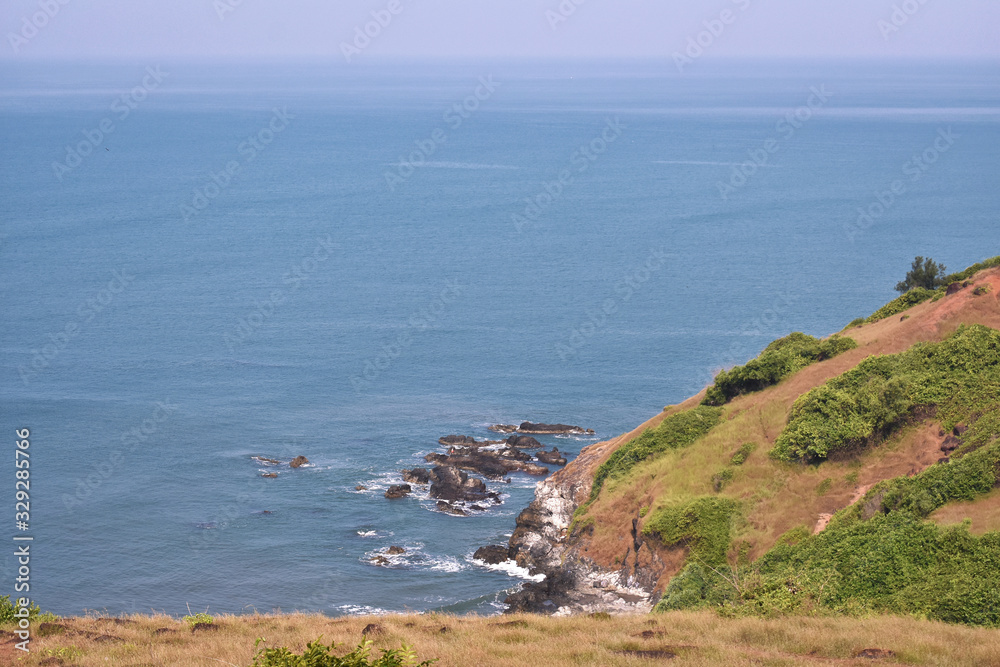 view of the ocean from top of the hill near chapora fort in goa