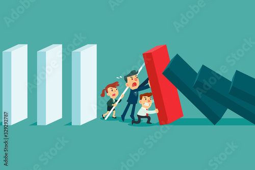 business team stopping falling domino effect