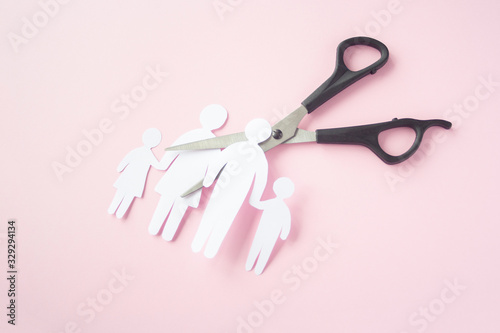 black scissor cutting family paper cut , dysfunctional family, bad children development, divorce parent broken family concept, mental health