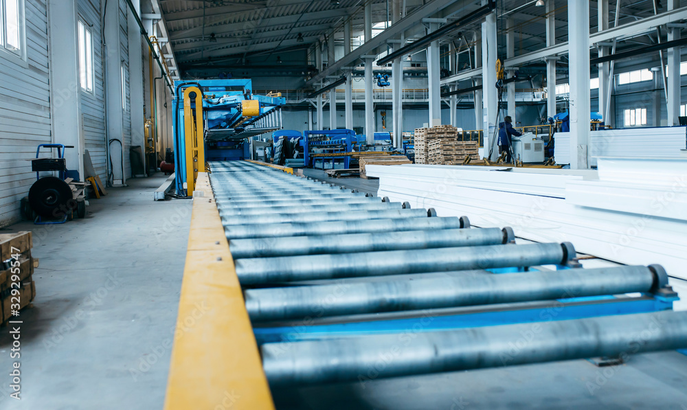 Fotografie Metal sheet roof rolled from rolling machine