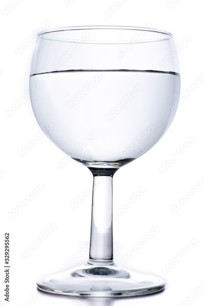 glass of water on a white isolated background glass of water on a white isolated background