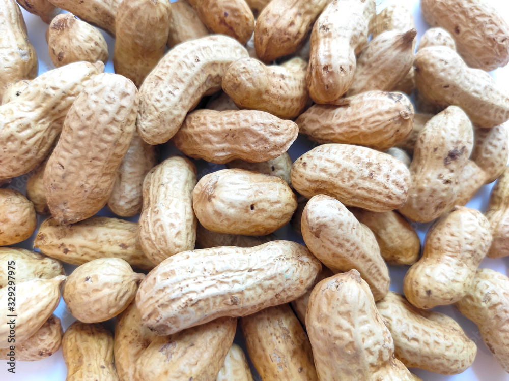 Group of Unpeeled peanuts in shell for background. Group of Unpeeled peanuts in shell for background.