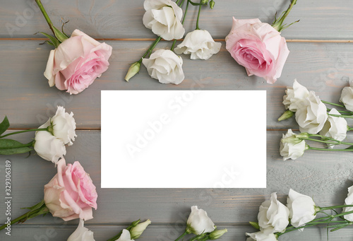 Spring card template. Happy Birthday or Valentine. Women's Day. Greeting card for mother's day. Congratulation with Easter. Flower card. Copy space. Wedding invitation. Flowers on grey background