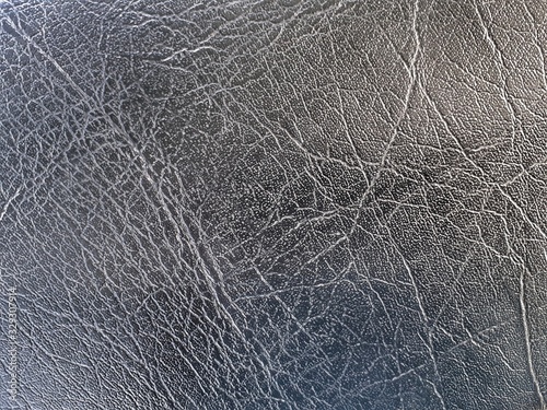 Texture of bike seat. black colour leather background.