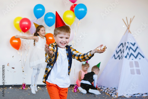 Children celebrate a birthday.