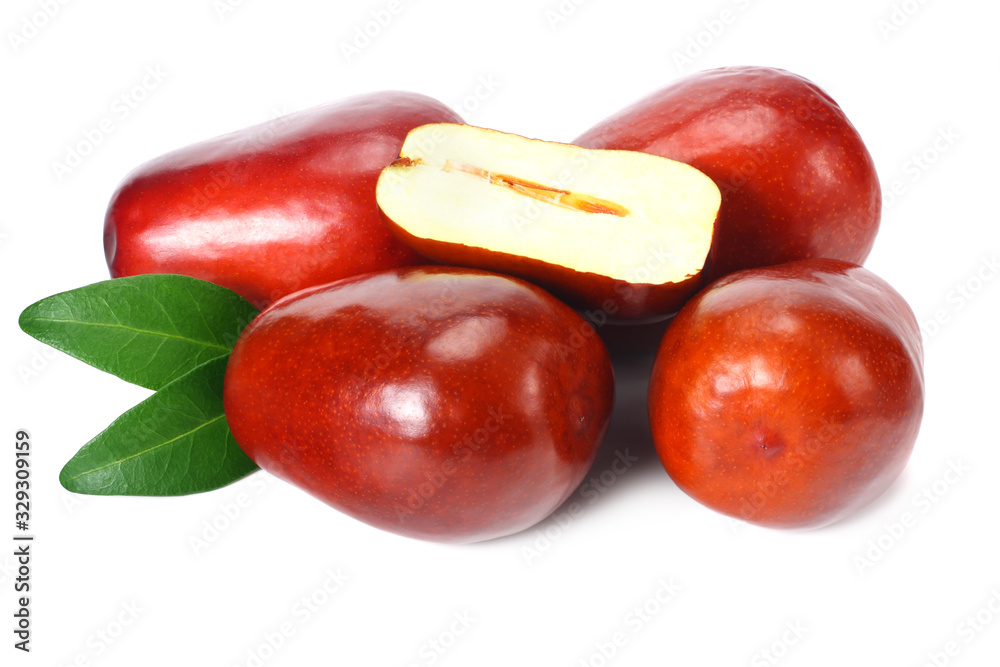 fresh date fruit with sleces and leaves isolated on white background. fresh date fruit with sleces and leaves isolated on white background.