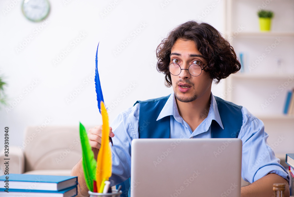 Young writer working on his new work Young writer working on his new work