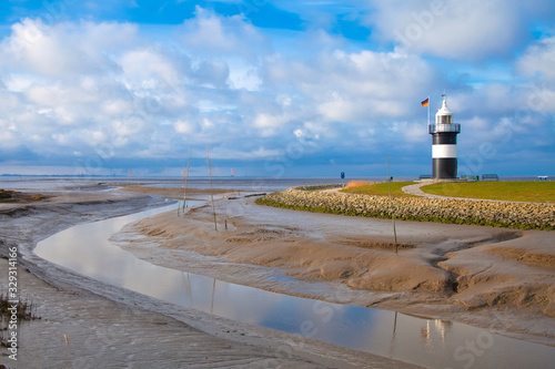 Obraz na plátně lighthouse with low tide