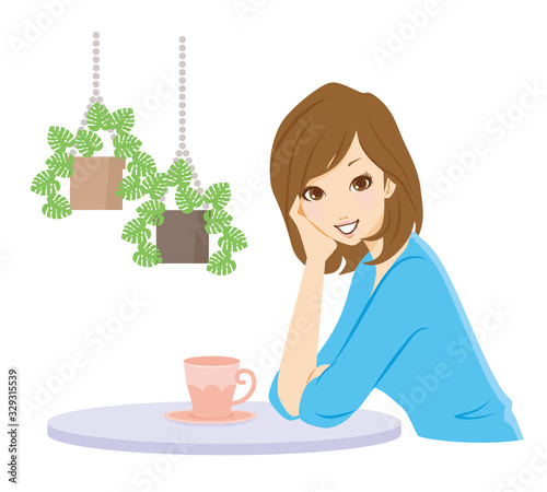 頬杖　女性　笑顔　ティータイム