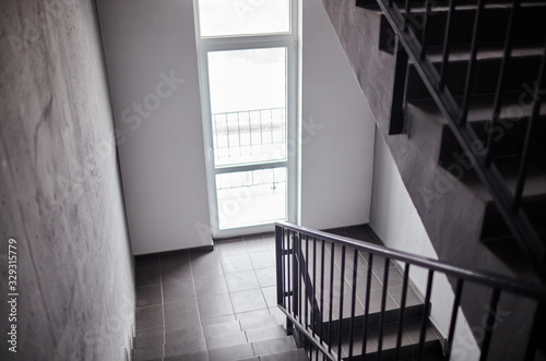 Staircase - emergency exit in hotel or office building, close-up staircase, interior staircases. Staircase in modern building